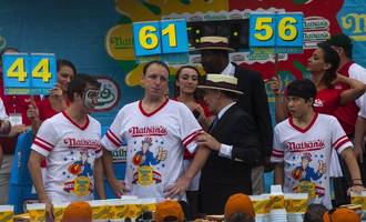 Americans gobble hot, move on with parades on rain-soaked July 4th